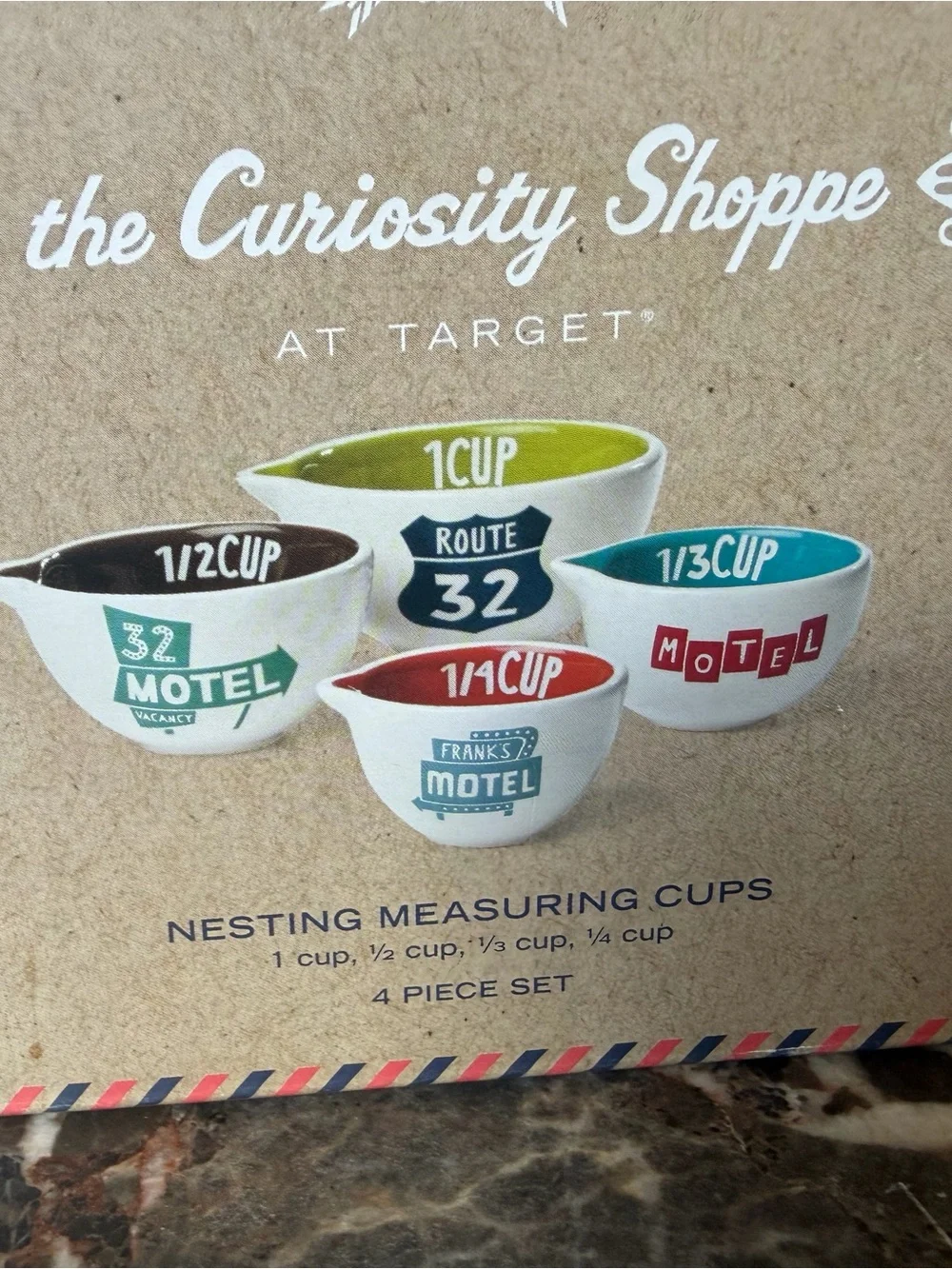 The Curiosity Shoppe Nesting Measuring Cups - Multicolor